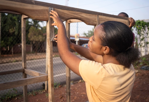 Medium shot woman measuring with ruler