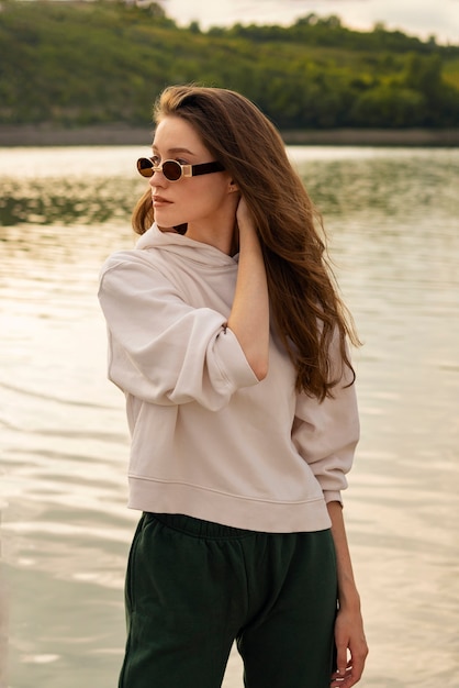 Medium shot woman posing outdoors