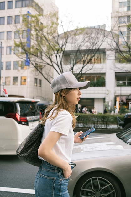 Medium shot woman wearing trucker hat