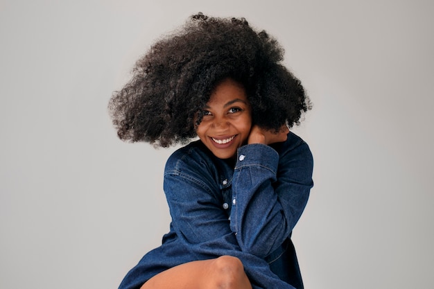 Medium shot woman with afro hairstyle