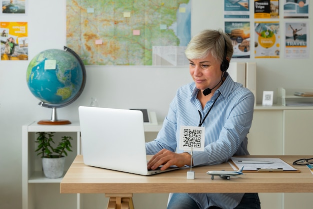 Medium shot woman working as a travel agent