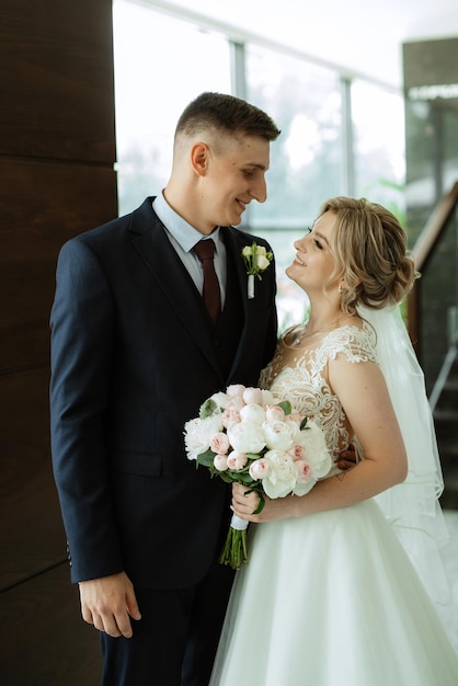 meeting of the bride and groom in the hotel lobby