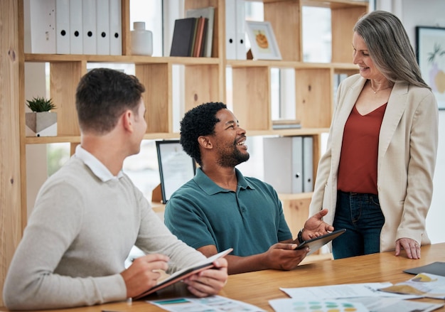 Meeting planning and strategy with a female leader manager or boss and colleagues or employees discussing work in the boardroom Motivated staff and CEO talking mission and vision in the office