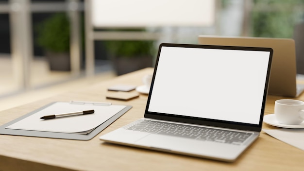 Meeting table workspace with notebook laptop on wooden meeting table closeup