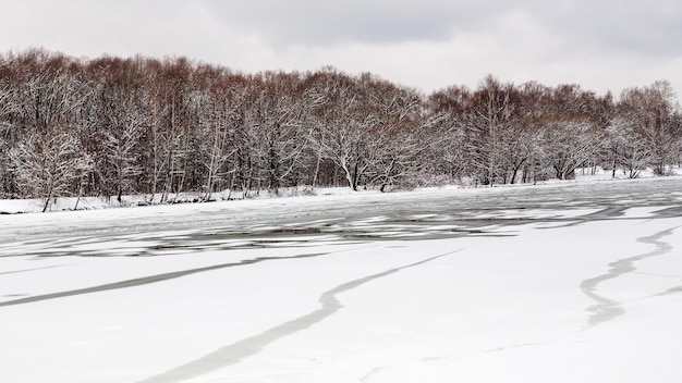 Melting ice surface of frozen river