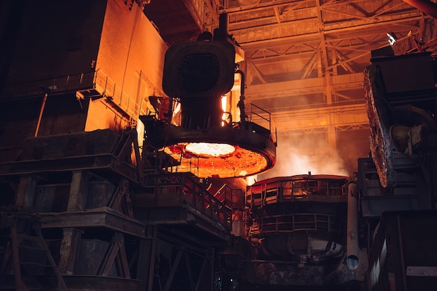 Melting of metal in a steel plant. High temperature in the melting furnace.