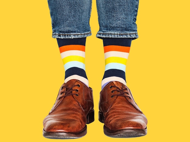 Men's legs trendy shoes and bright socks