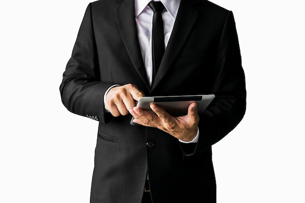 Men wearing a black suit, look credible, a businessman, wearing a white shirt, a black tie, a mobile tablet is working.