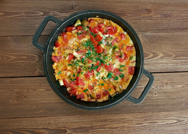 Menemen  - traditional Turkish dish.includes eggs, onion, tomato, green peppers, and spices .commonly eaten for breakfast