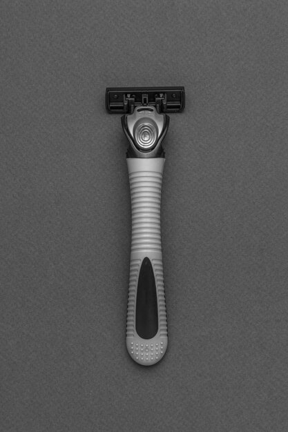 Mens grey razor on a grey background