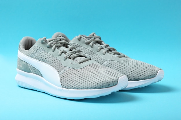 Mens sneakers on a colored background mens footwear minimalism