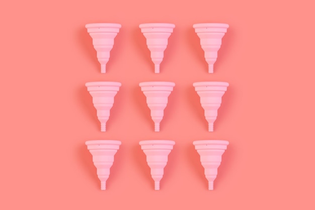 Photo menstrual pink cups pattern on a pink background monochrome zero waste concept ecofriendly