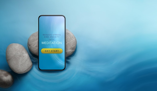 Mental Health Concept Using Tech to Healing and Practicing Mind Self Care and Soothing Life Meditation App show on Mobile Scene as Zen with Gentle Motion Water and Pebble Stone Top View