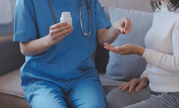 Mental health counselor Young woman during therapy session talking with a psychologist in the office