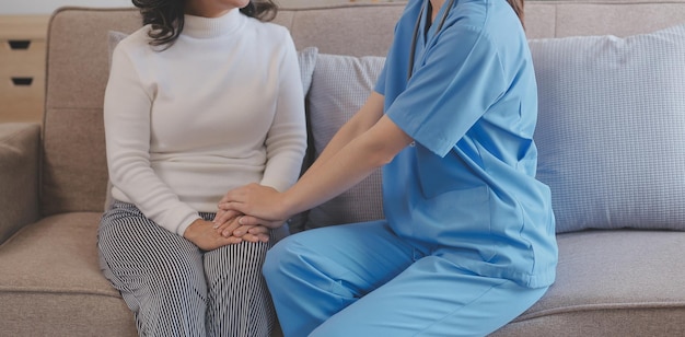 Mental health counselor Young woman during therapy session talking with a psychologist in the office