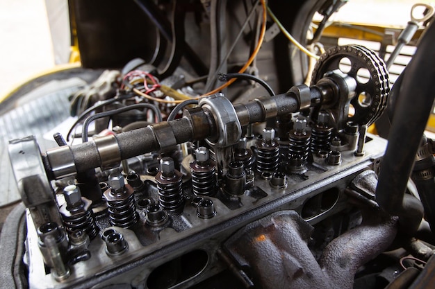 Mercedes diesel engine repair Hands with a mechanic repairing Mercedes parts