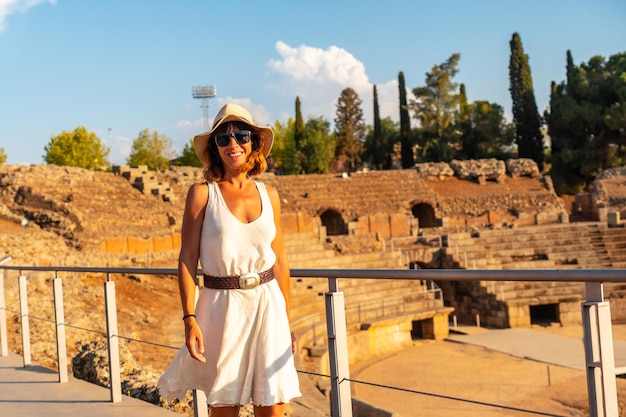 Merida Roman Ruins a young woman in a white dress in the Roman Amphitheater Estremadura