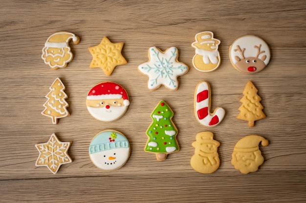 Merry Christmas with homemade cookies on wood table background Xmas party holiday and happy New Year concept