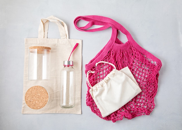 Mesh cotton bag, reusable glass containers and water bottle