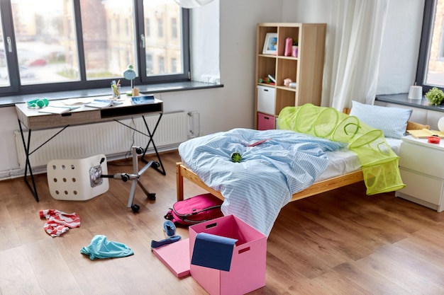 Photo messy home or kids room with scattered stuff