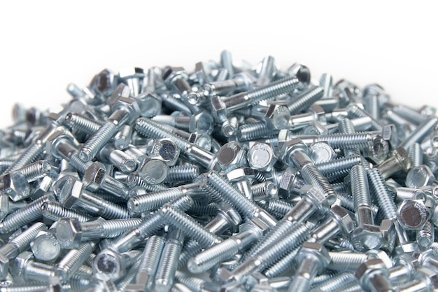 Metal bolts on a white background engineering fasteners