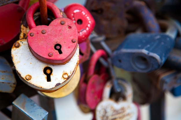 Metal bridge with a lot of locks. Wedding Traditions