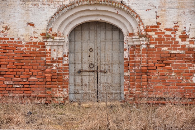 Metal door in wall of fortress