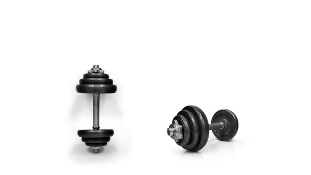 Photo metal dumbbells isolated on white background gym fitness and sports equipment symbol area for entering text