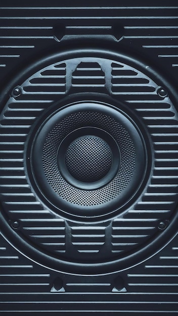 Photo metal grill closeup texture of a music speaker soft focus