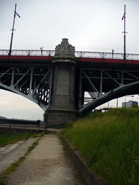 metal and iron construction of the bridge in warsaw poland europe over river old