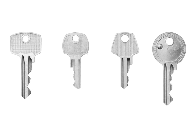 Metal key on white background