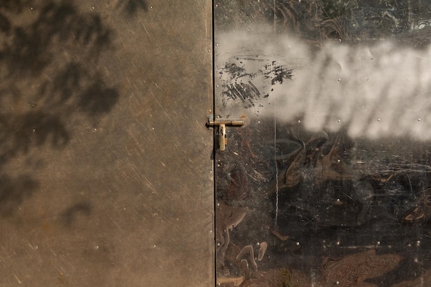 Metal rusty door with black paint background