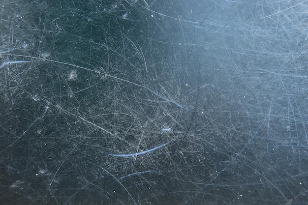 metal scratches blue background abstract / empty blank frame scratches on metal