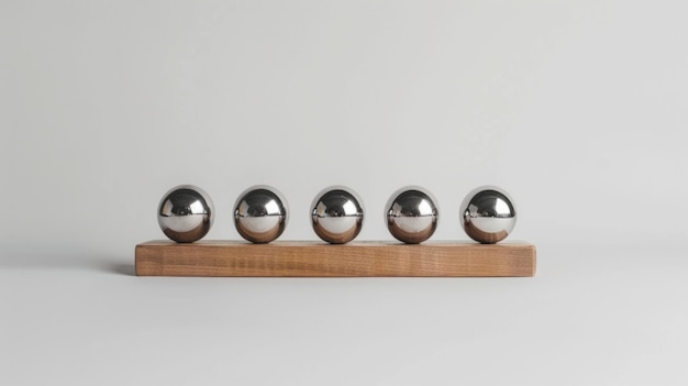 Metal Spheres on Wooden Stand