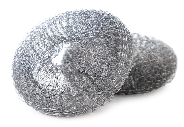 Metal sponges for household close-up on a white background. Isolated