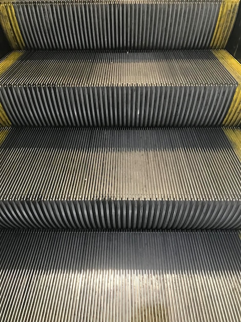 Photo metal steps of an escalator