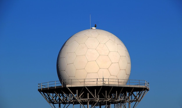 Metal tower of aeronautical meteorological spherical radar antenna outdoor