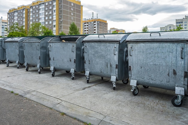 Metal trash cans for separate waste collection in a densely populated area of the city