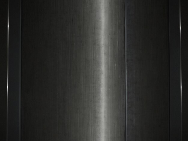 a metal wall with a black background that says quot the word quot on it