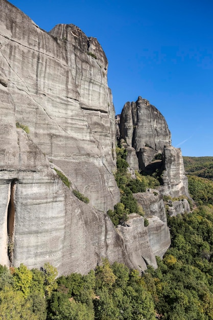 Meteora unique and enormous columns of rock rise precipitously from the ground beside the Pindos Mountains Western region of Thessaly Kalabaka Greece