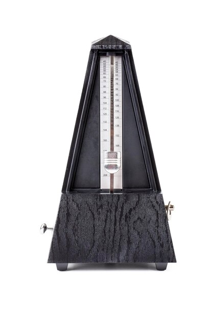 Metronome in action isolated and on a plain background