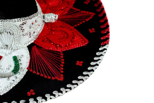 Mexican charro hat on white background. Typical mexican hat with the colors of the mexican flag.