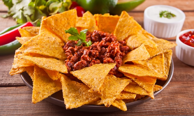 Mexican corn chips nachos with salsa dip