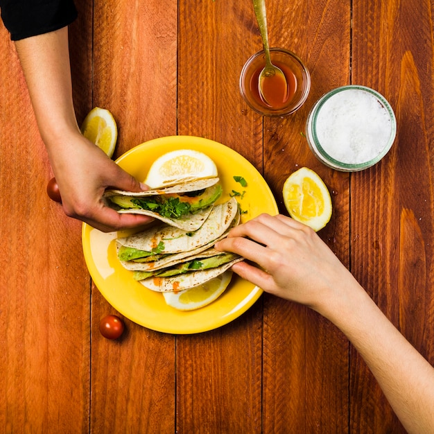 Mexican food concept with tacos on plate