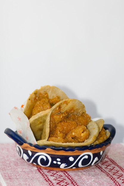 Mexican gorditas de migajas with pork rinds and chile