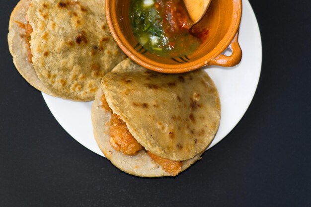 Mexican gorditas de migajas with pork rinds and chile