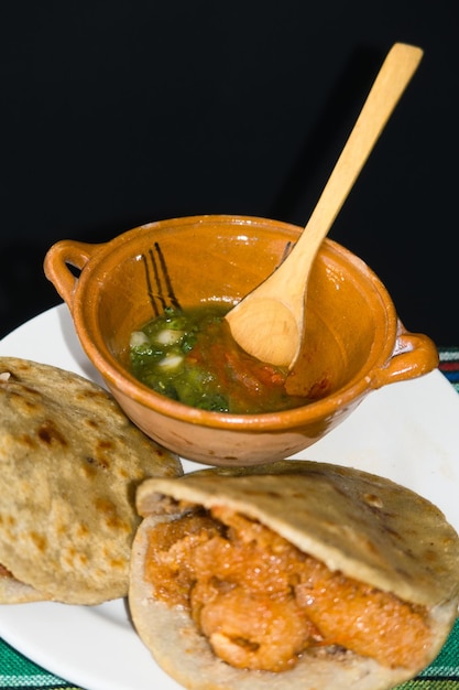 Mexican gorditas de migajas with pork rinds and chile