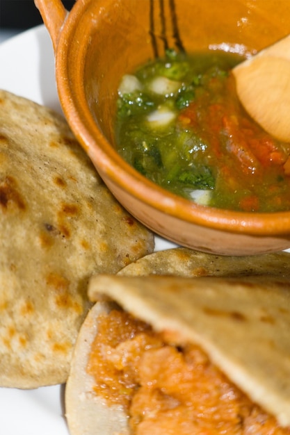 Mexican gorditas de migajas with pork rinds and chile