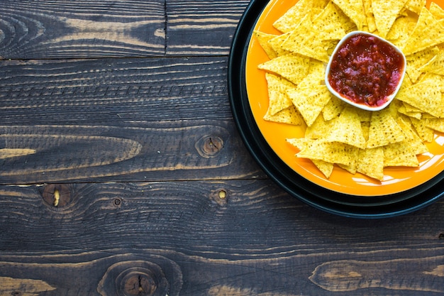 Mexican nachos chips  on wooden background