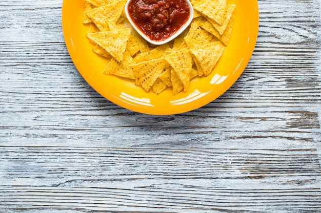 Mexican nachos chips  on wooden background